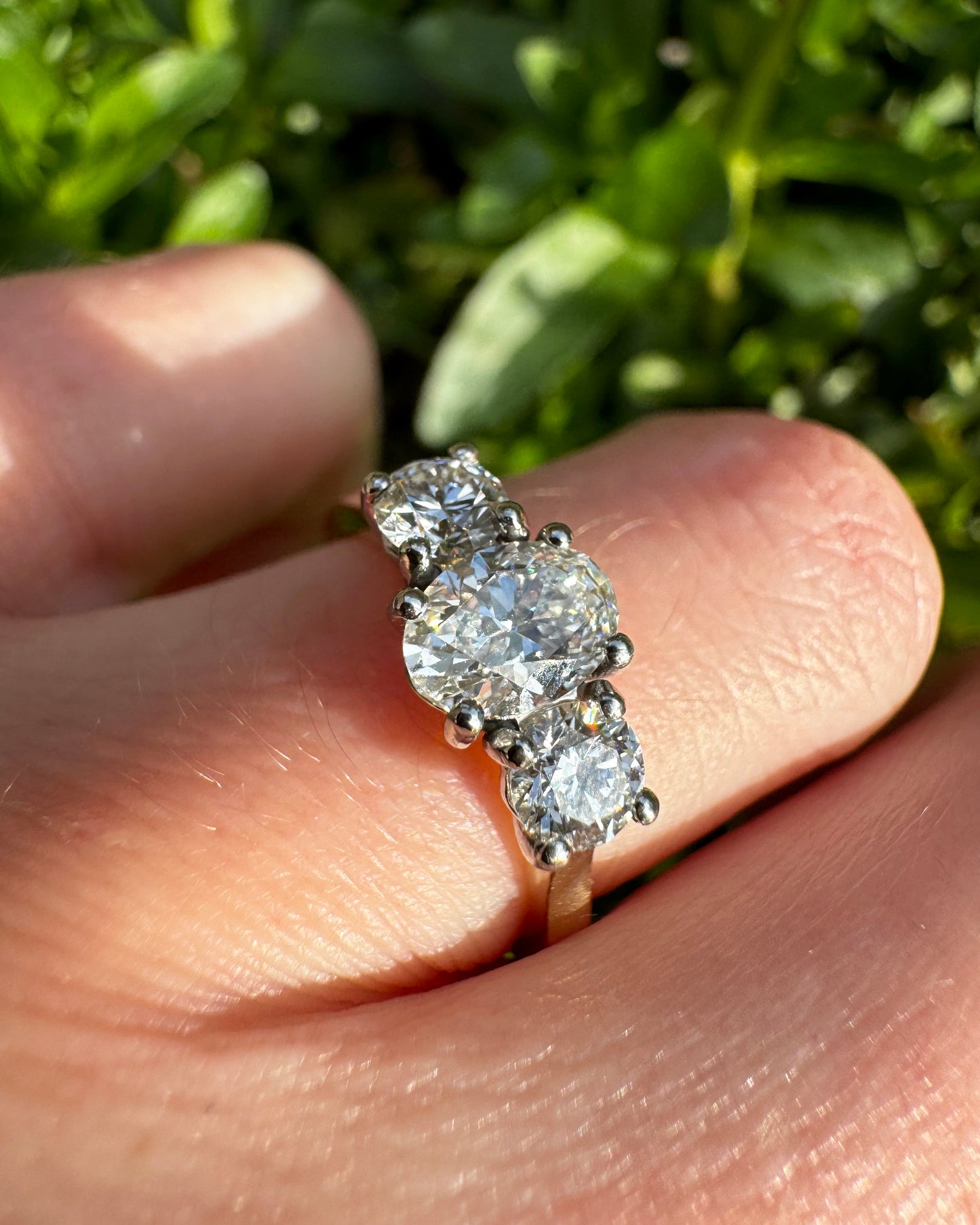 Oval & Round Brilliant Cut Trilogy Diamond Ring