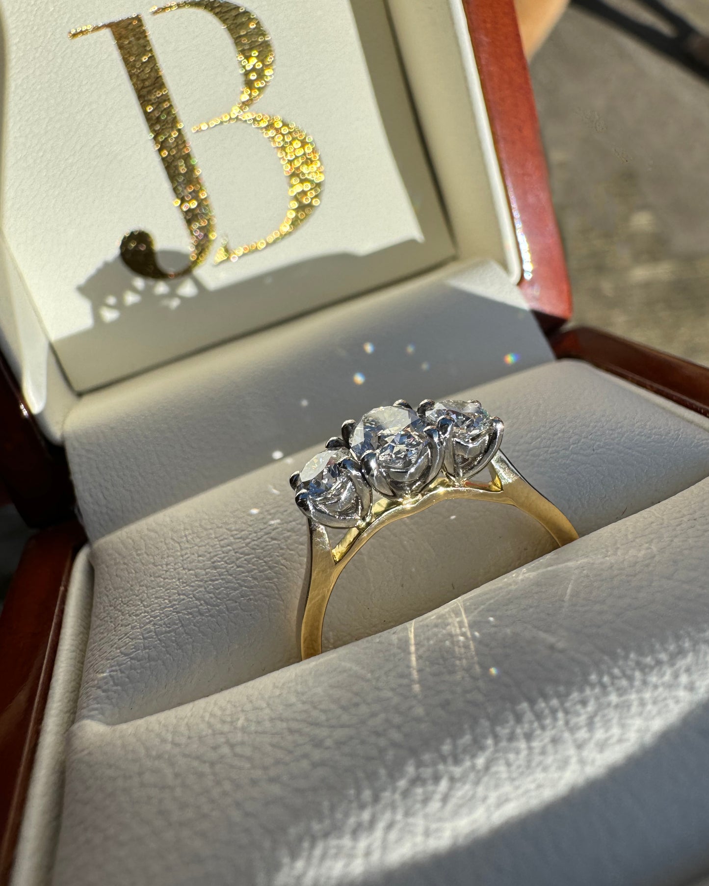 Oval & Round Brilliant Cut Trilogy Diamond Ring