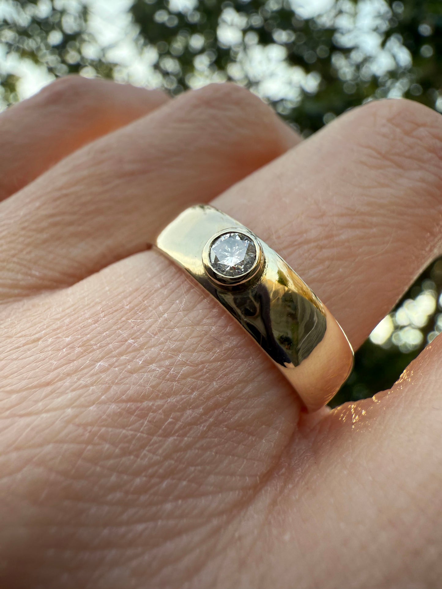 Rubover set Round Diamond Ring