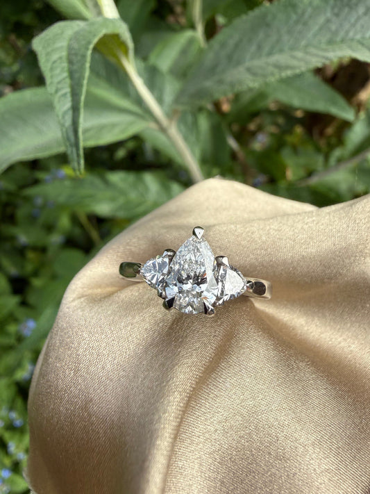 Pear & Trillion cut Trilogy Diamond Ring