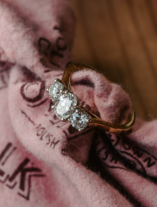 Oval & Round Brilliant Cut Trilogy Diamond Ring